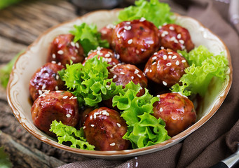 Meatballs with beef in sweet and sour sauce. Asian food.