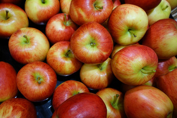 Delicious red apples as background