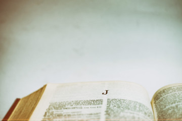 Close up Romans Letter J on Dictionary book