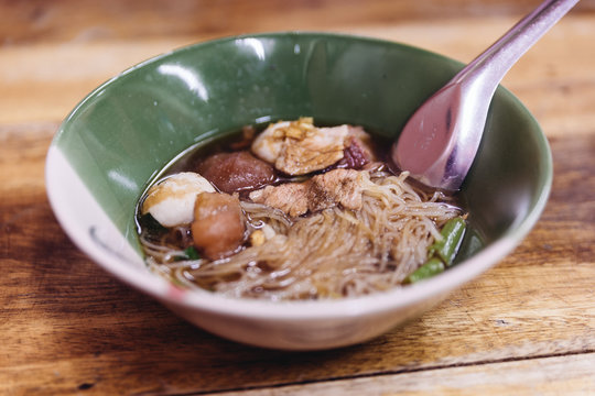 Beef rice noodle with soup and meat ball. 