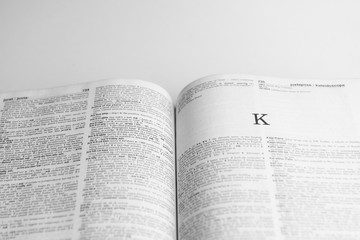 Fototapeta premium Close up Romans letter on open book with balck and white style