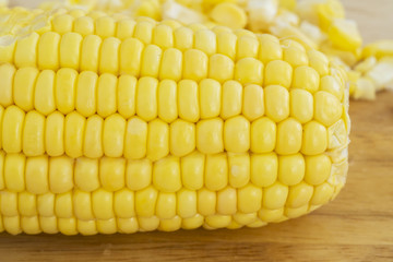 Fresh cob of sweet corn on the table