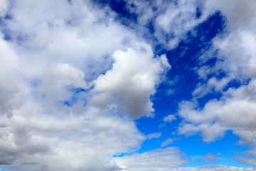 Clouds on a blue sky as a background