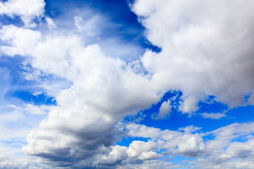 Clouds on a blue sky as a background