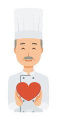 An elderly male chef wearing a cook coat has a heart mark