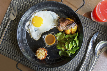 Tasty beef steak on the grill pan