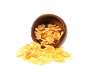 tasty cornflakes isolated on wood bowl on white background
