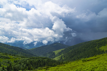 Fototapeta na wymiar Mountain valley with clouds. Rainy day.Beautiful landscape