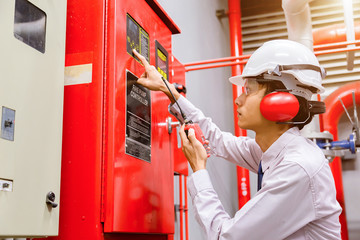Engineer checking Industrial fire control system,Fire Alarm controller, Fire notifier, Anti...