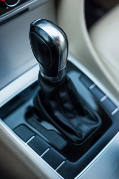 close up view of black car gearstick