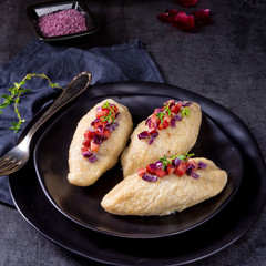 Cepelinai, a specialty Lithuanian and Polish cuisine.