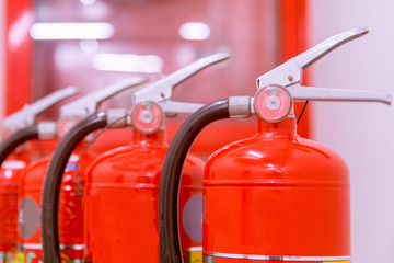 Red tank of fire extinguisher Overview of a powerful industrial fire extinguishing system.