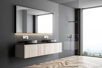 Double sink in a gray bathroom interior side view