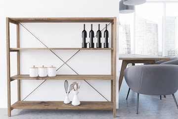 Shelves with wine bottles, dining room