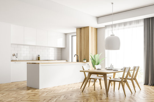 White and wooden kitchen corner, table