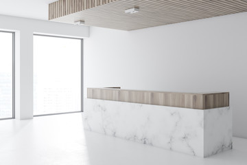 Marble reception in white office lobby