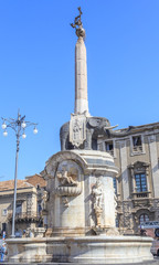 Fototapeta na wymiar Fountain (Fontana) dell'Elefante at cathedral square ( Piazza Duomo) in Catania, Sicily is symbol of City