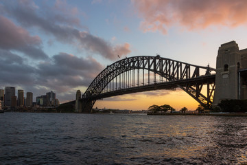 Fototapeta na wymiar Sydney harbour bridge at sunset, the iconic landmark of Australia