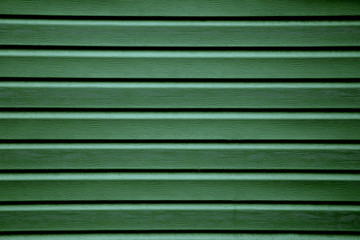 Green trim panels to the outer part of the building.