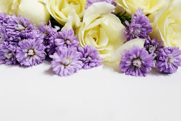 White roses and Purple Marguerite Daisy flowers isolated on white background. Use for Valentine day and ultra violet for 2018 concept background.Copy space