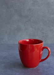 red cup on gray background