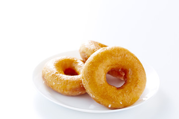 Donut isolated on a white plate