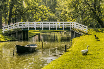 bridge and boat in the gardens surrounding the city of Kampen. netherlands holland