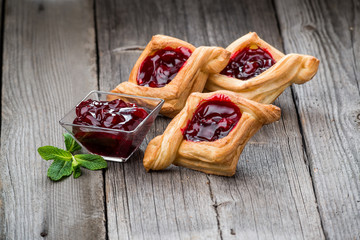 Fresh fruit tart with berries jam , mint on wooden background. Desert. Morning healthy breakfast and evening dinner.