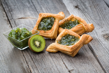 Fresh fruit tart with berries jam , mint on wooden background. Desert. Morning healthy breakfast and evening dinner.