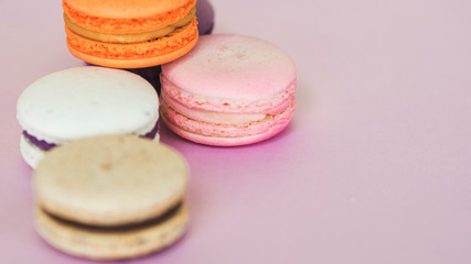 Set of colorful French macaroni cakes. Sweet almond cookies with different flavors.