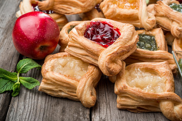 Fresh fruit tart with berries jam , mint on wooden background. Desert. Morning healthy breakfast and evening dinner.