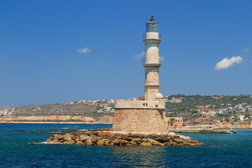 Fototapeta na wymiar The old 16th centurary Lighthouse at the Harbour enterance of Chania on the Greek Island of Crete