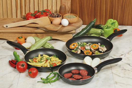 food in a variety of pans