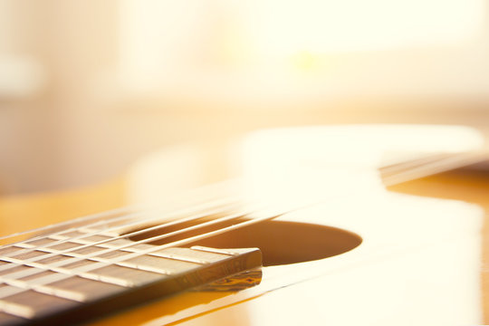 Guitar strings, sunlight
