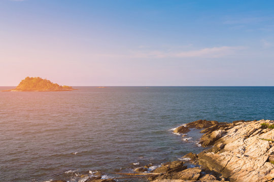 Rock beach over ocean skyline, natural landscape background
