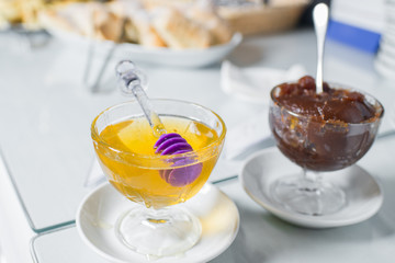A fresh honey in glass on the buffet table