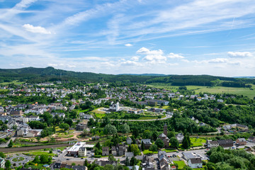 Fototapeta na wymiar Gerolstein City with view from the Munterley on the City. The Home of the premium Water. Vulkaneifel Rheinlandpfalz Deutschland