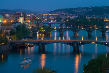Fototapeta na wymiar Prague bridges in the evening landscape. Czech Republic, Prague