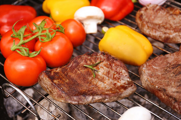 Modern grill with meat and vegetables outdoors, closeup