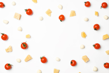 Flat lay composition with ingredients for pizza on white background