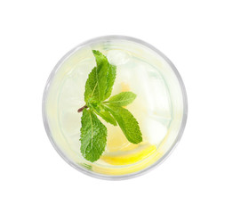 Glass with natural lemonade on white background, top view