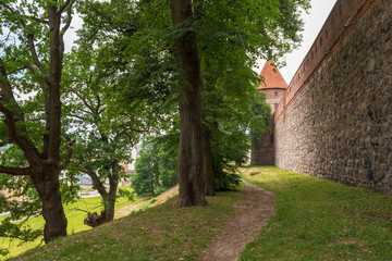 Pathway along gothic castle in Bytow. Poland