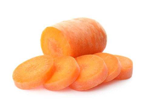 Ripe sliced carrot on white background
