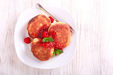 Quark cheese fritters with raspberry jam