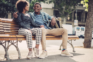 Young happy black couple outdoors