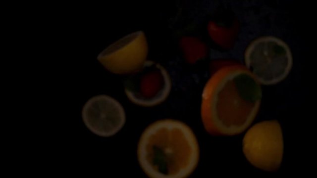 Fresh fruits frozen in mid-air. Shooted in super slow motion
