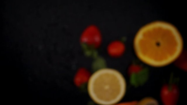 Fresh fruits frozen in mid-air. Shooted in super slow motion
