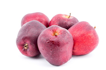 Red apples on a white background.