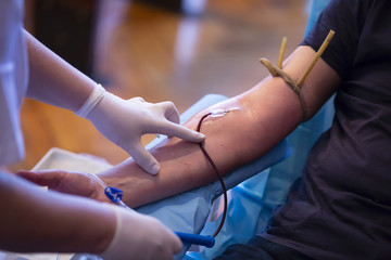 Blood donation hand. Nurse hands - obrazy, fototapety, plakaty