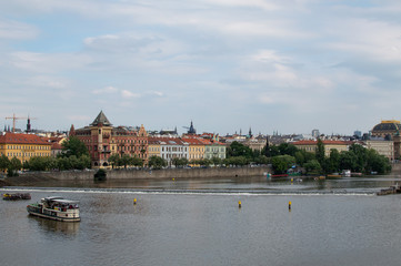 Fototapeta na wymiar Prague across the Valtava